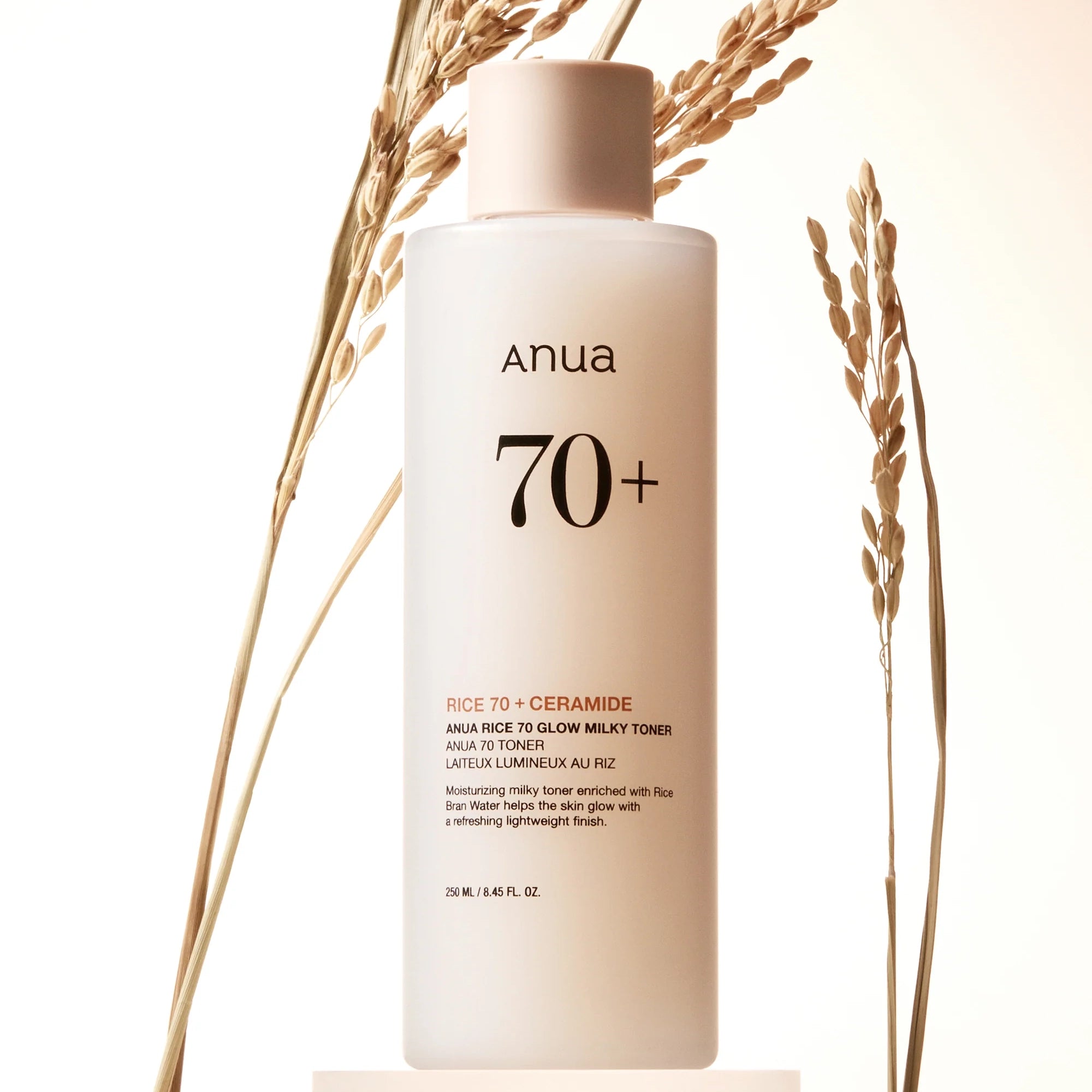 Pieniņveida toniks mirdzuma piešķiršanai ādai ar rīsiem Anua Rice 70 Glow Milky Toner