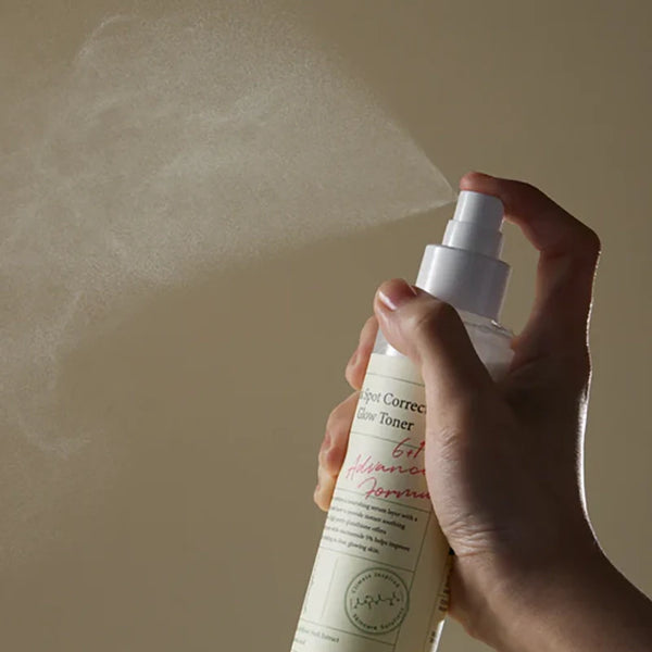 Balinošs izsmidzināmais toniks pēcaknes plankumu novēršanai Axis-Y Dark Spot Correcting Glow Toner